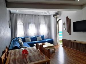 TV a/nebo společenská místnost v ubytování Balcon Bleu