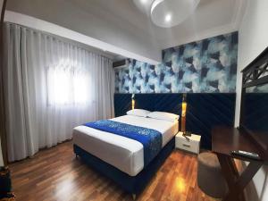 Postel nebo postele na pokoji v ubytování Balcon Bleu