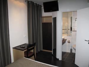 טלויזיה ו/או מרכז בידור ב-Source Hôtel
