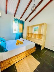 מיטה או מיטות בחדר ב-Villa senseo