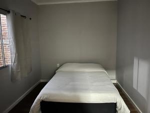 Ένα ή περισσότερα κρεβάτια σε δωμάτιο στο Relax 6