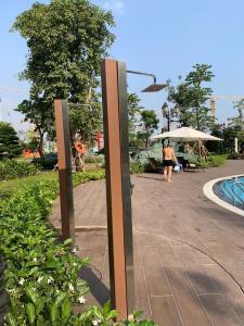 a couple of tall metal poles in a park at Lahomestay 1PN Tiện Nghi Được Khách Yêu Thích in Gò Công