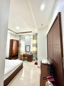Rúm í herbergi á Hoàng Anh hotel