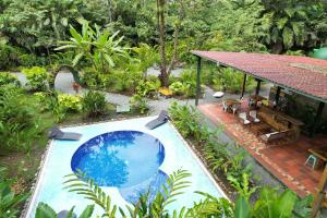 an overhead view of a swimming pool next to a house at Nowhere in Bocas del Toro