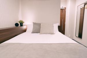 Voodi või voodid majutusasutuse R Hotel Honmachi toas