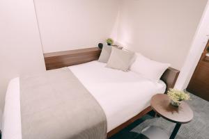 Voodi või voodid majutusasutuse R Hotel Honmachi toas