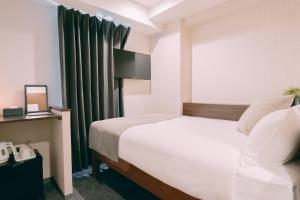 Voodi või voodid majutusasutuse R Hotel Honmachi toas