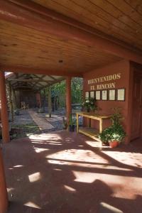 a building with a sign that says harlemiuses of the library at El Rincon Eco Hotel in Los Ángeles