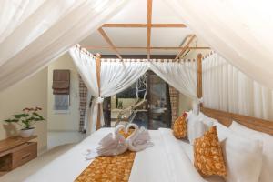 Postel nebo postele na pokoji v ubytování Villa Mayasari 6 Bed Rooms