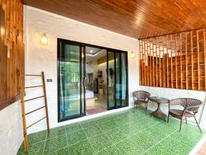Posezení v ubytování Dara Homestay