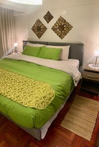 Voodi või voodid majutusasutuse Cusco Magico 7 - Minidepartamento Las Torres Kayser toas