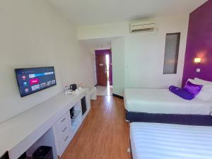 Postel nebo postele na pokoji v ubytování HOTEL TILAMAS