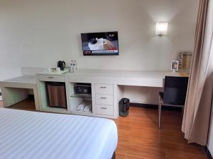 TV a/nebo společenská místnost v ubytování HOTEL TILAMAS