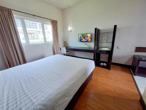 Postel nebo postele na pokoji v ubytování HOTEL TILAMAS