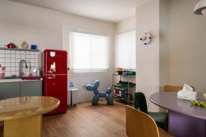 Η κουζίνα ή μικρή κουζίνα στο 双層公寓 Duplex Apt.