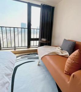 Łóżko lub łóżka w pokoju w obiekcie Manriver Executive Apartments