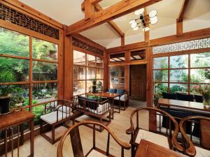 夕露小榭古城南门店 Xilu Xiaoxie Inn Old Town Lijiang餐厅或其他用餐的地方