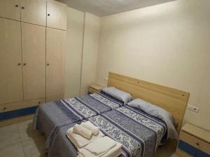 En eller flere senge i et værelse på Apartment in Mazarrón near La Isla Beach + 34 billeder