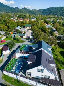 an aerial view of a building with solar panels on it at VİP Family Home in Gabala
