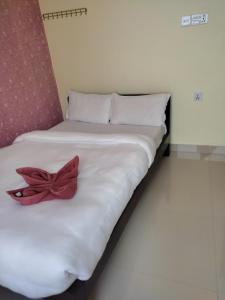 Una cama o camas en una habitación de Hotel Green Hill View