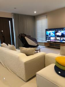 TV a/nebo společenská místnost v ubytování 温馨雅居