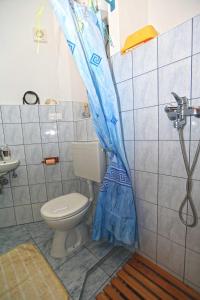 Kúpeľňa v ubytovaní Apartments Boćin Rosso