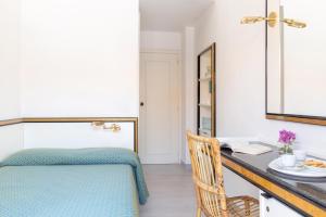 Posedenie v ubytovaní Hotel Il Telamonio