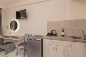 Kuchyň nebo kuchyňský kout v ubytování Daisy Hotel