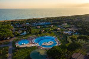 an aerial view of a resort near the ocean at Gitavillage California in Montalto di Castro