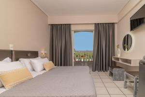 Postel nebo postele na pokoji v ubytování Daisy Hotel