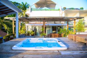 a swimming pool in the middle of a house at Mayumi Beach Villa in Boracay