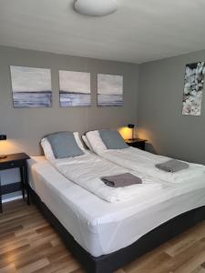 Grindavik Guesthouse self check in & outにあるベッド