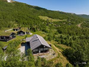 an aerial view of a house on a hill at Saballie - Cosy cabin - sunny location! 