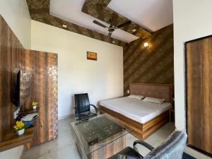 Voodi või voodid majutusasutuse Chouhan Palace toas