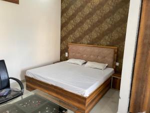 Voodi või voodid majutusasutuse Chouhan Palace toas