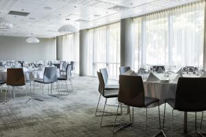 a conference room with white tables and chairs at Clarion Hotel Stavanger in Stavanger