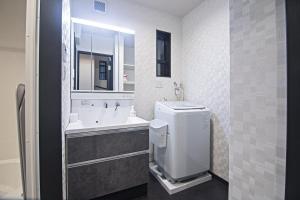Een badkamer bij -旅タイム 玉出東- 岸里玉出駅