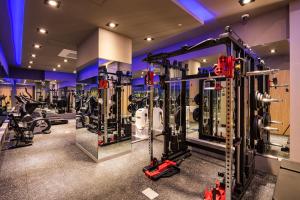 a gym with treadmills and machines at Sollago Myeongdong Hotel & Residence in Seoul