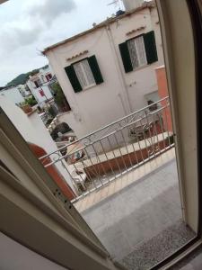 a view of a balcony from a window of a building at Casa Nannina in Ischia Town