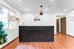 De lobby of receptie bij UPAR Hotels Thoraipakkam, OMR