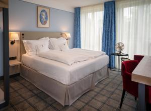 Postel nebo postele na pokoji v ubytování Hotel König Ludwig II