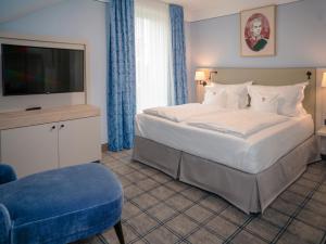 Postel nebo postele na pokoji v ubytování Hotel König Ludwig II