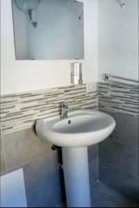 Et badeværelse på Piccola Flo rooms