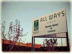 a sign for a garden hotel and lobby at All Ways Garden Hotel & Leisure in Castel di Leva