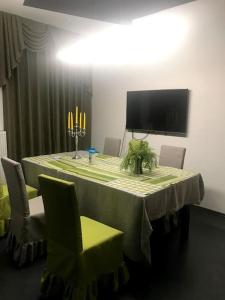 TV a/nebo společenská místnost v ubytování Duna Riverside