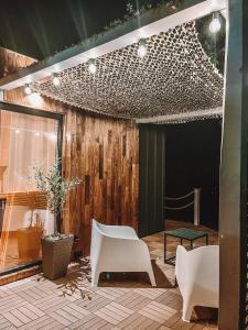 Predel za sedenje v nastanitvi Elysian Fields - Tiny House 'Evergreen'