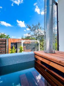 Balkon oz. terasa v nastanitvi Elysian Fields - Tiny House 'Evergreen'