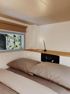 Ein Bett oder Betten in einem Zimmer der Unterkunft Kos One Hostel