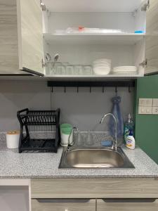 Kuchyň nebo kuchyňský kout v ubytování Marni BKK Hostel