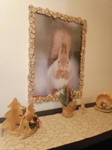 a picture of a rabbit in a mirror at Casa Flippola - Trilocale Santa Caterina Centro Paese in Santa Caterina Valfurva